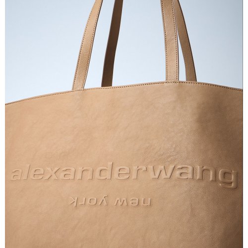 Alexander <span style='filter: blur(2.5px);'>****</span> Punch Tote Bag