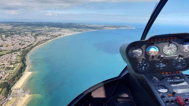 Private 12 Mile R44 Helicopter Flight for up to Three People